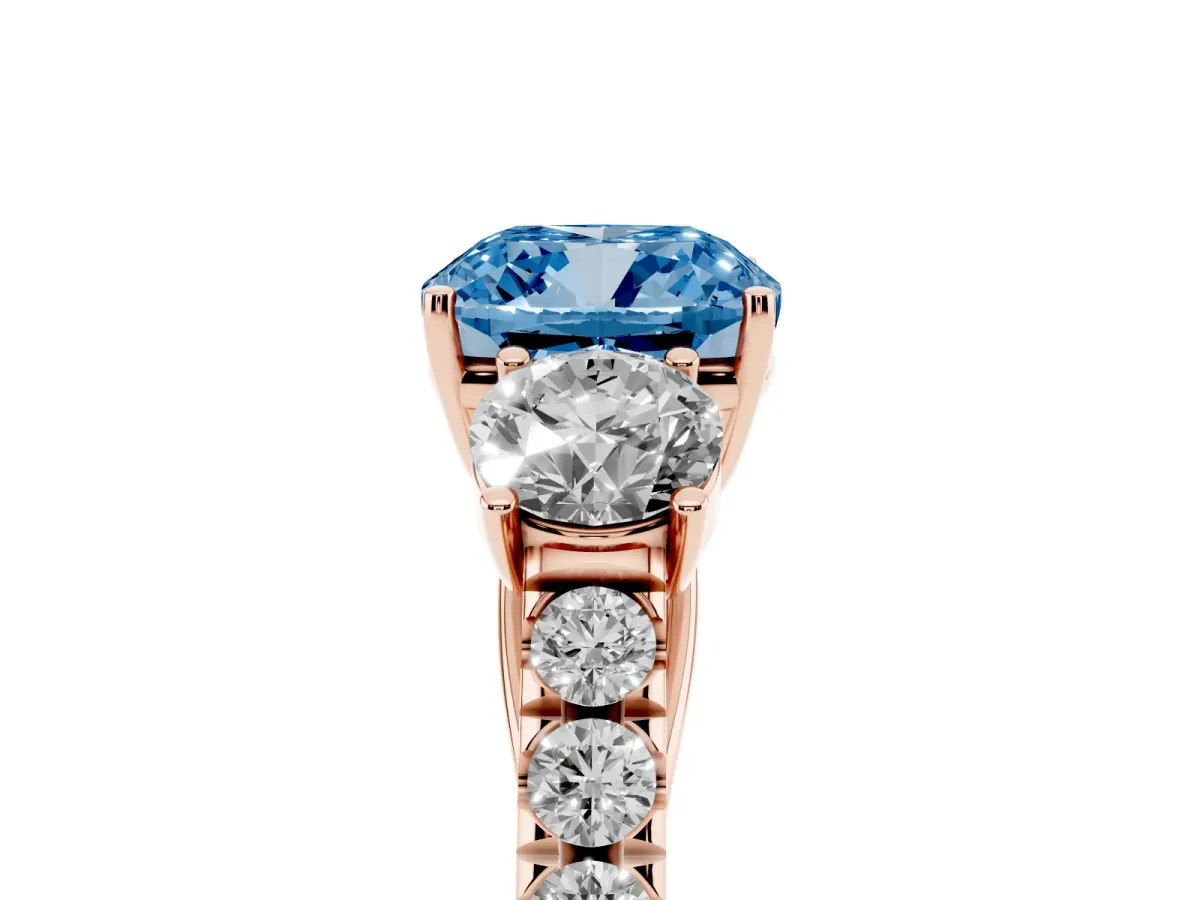 Fancy Blue Cushion Cut Cut Diamond Three-Stone Ring with Round Side Stones and Pavé Band Rose gold