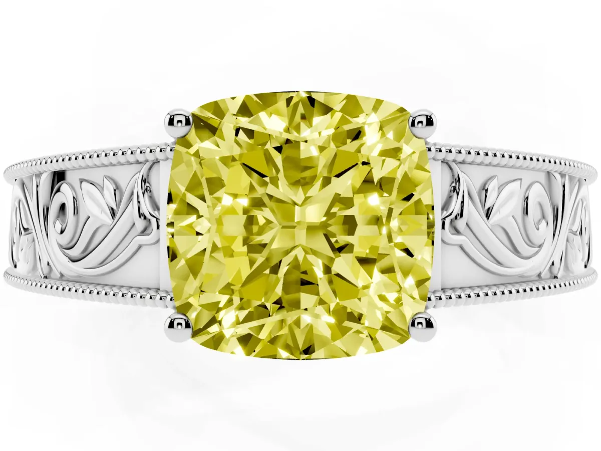 Fancy Yellow Cushion Cut Diamond Solitaire Ring with Engraved Band and Four-Prong Setting Silver