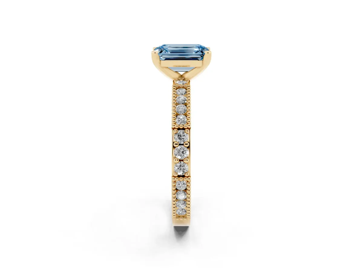 Fancy Blue Emerald Cut Solitaire with Pavé Band and Four-Prong Setting Yellow gold