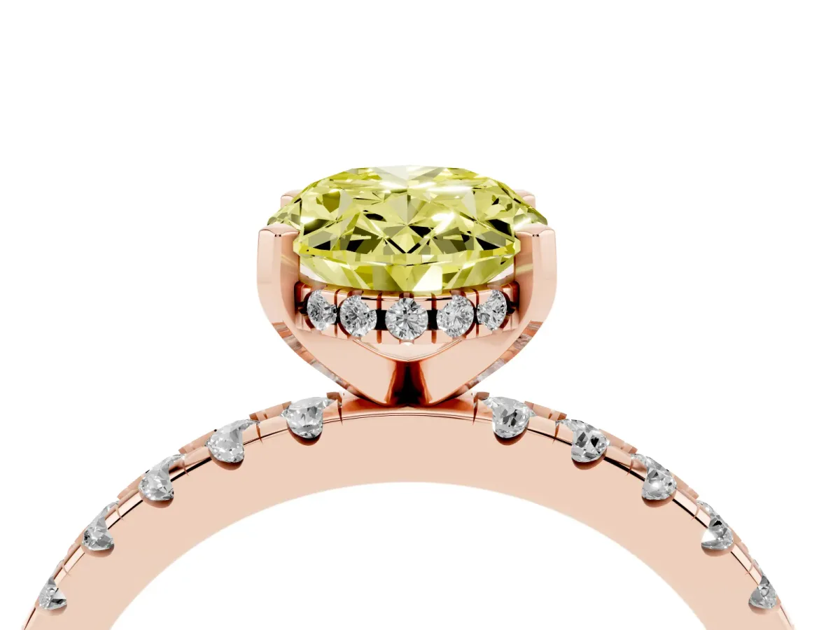 Fancy Yellow Oval Cut Diamond Solitaire Ring with Round Pavé Band and Four-Prong Setting Rose gold