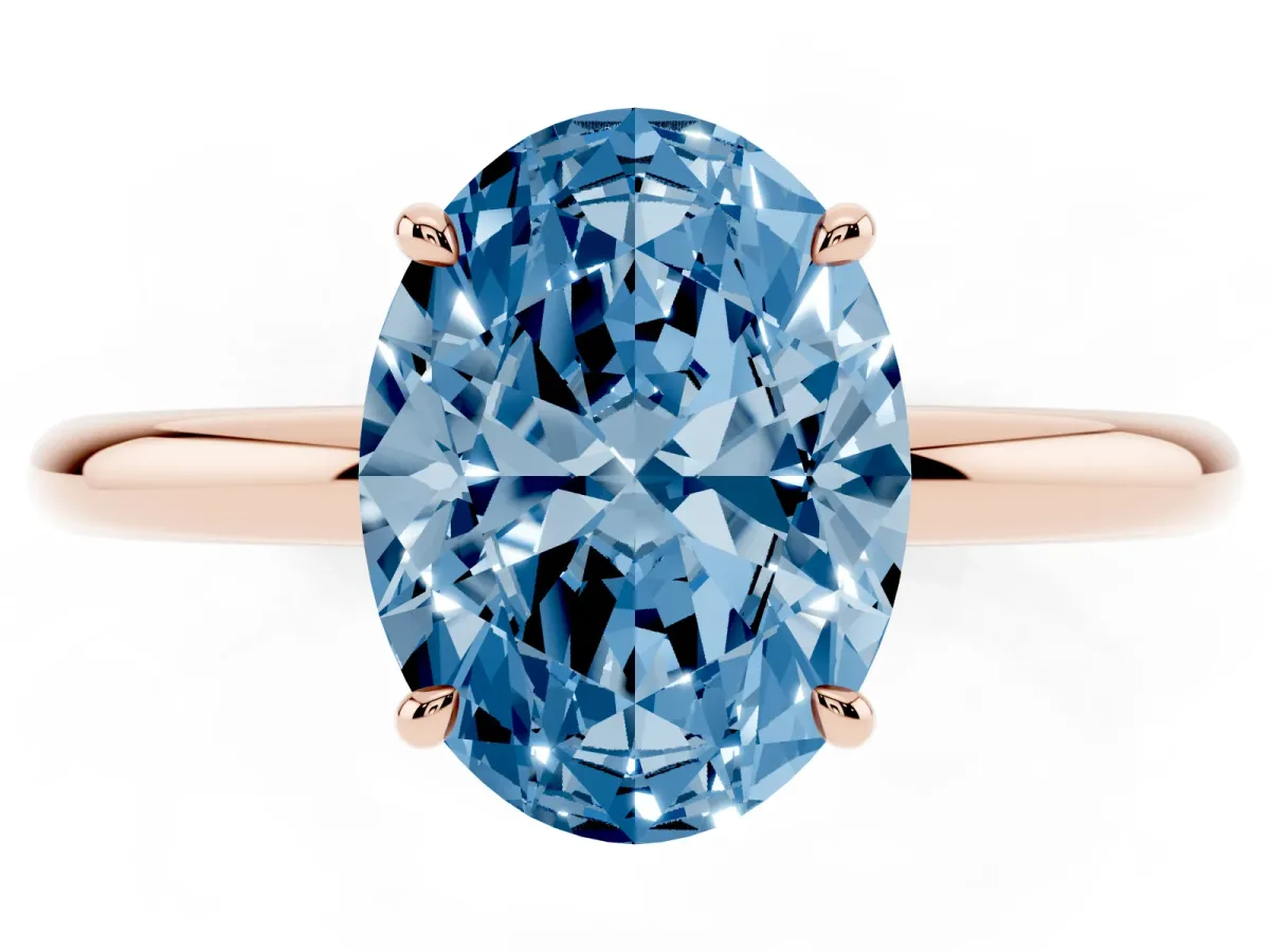 Fancy Blue Oval Cut Diamond Solitaire Ring with Thin Band and Four-Prong Setting Rose gold