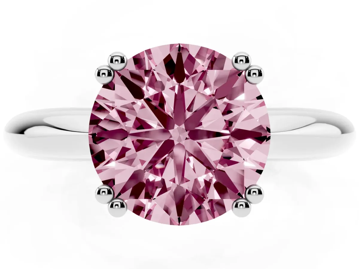 Fancy Pink Round Cut Cut Solitaire Engagement Ring with Tapered Band and Four-Prong Setting Silver