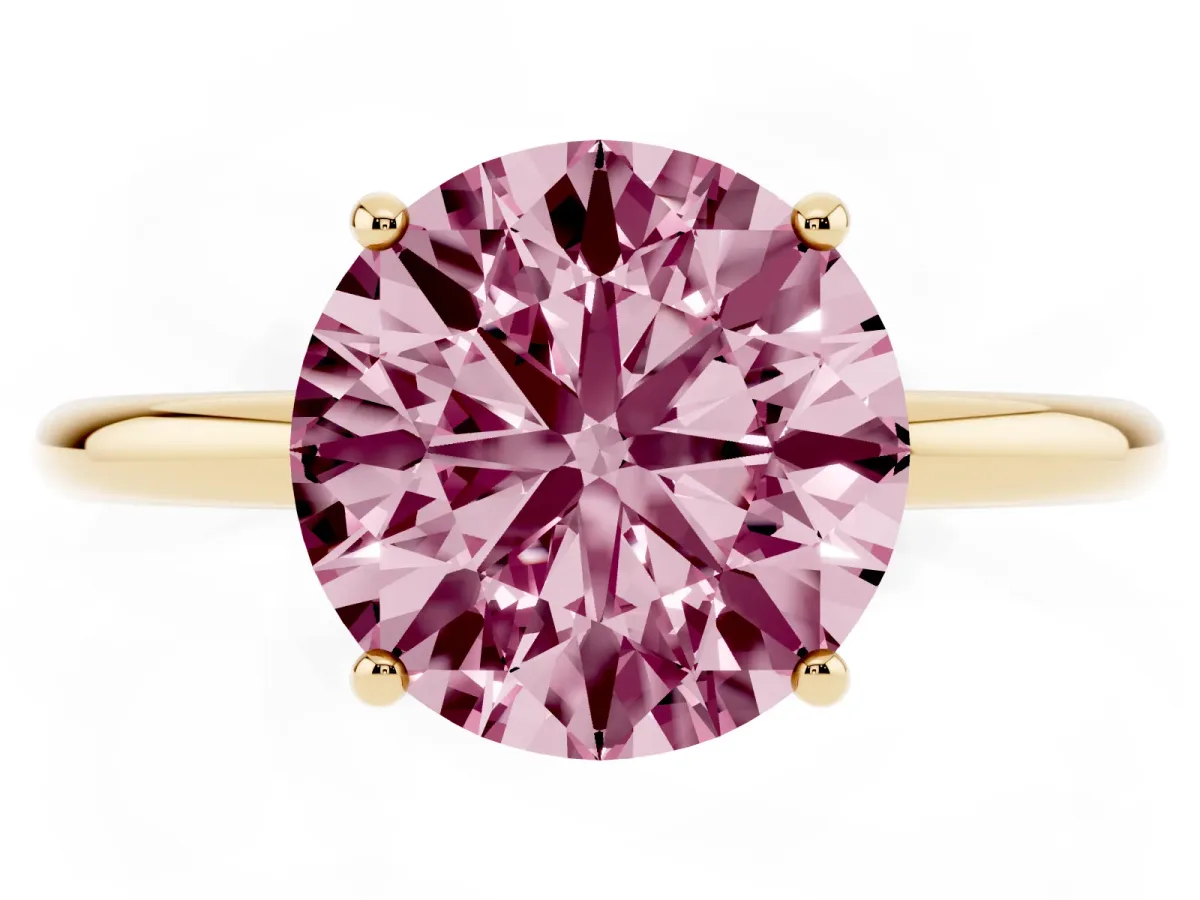 Fancy Pink Round Cut Solitaire Diamond Ring with a Classic Band and Four-Prong Setting Yellow gold