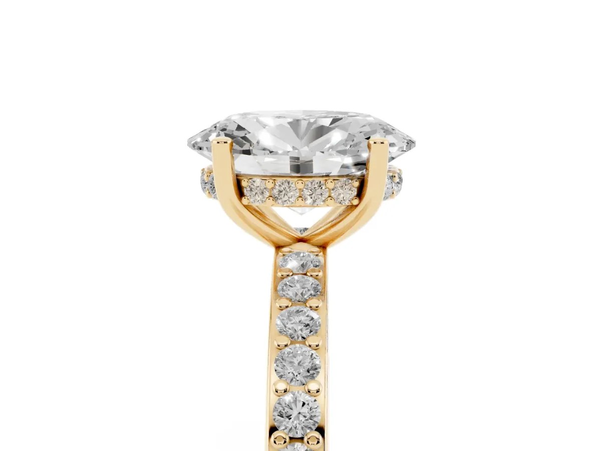 Oval Cut Cut Diamond Pavé Band Ring with Four-Prong Setting Yellow gold