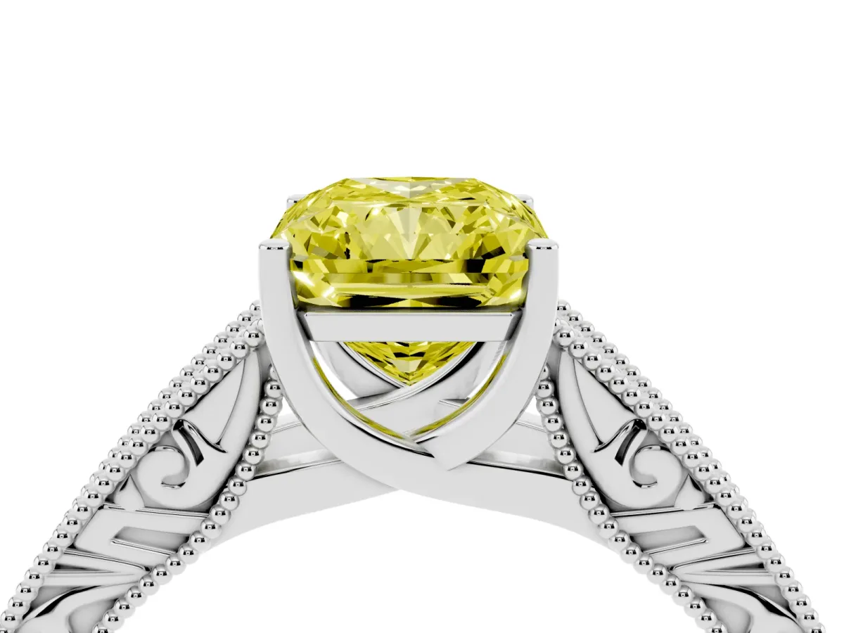 Fancy Yellow Radiant Cut Diamond Solitaire Ring with Engraved Band and Four-Prong Setting White gold