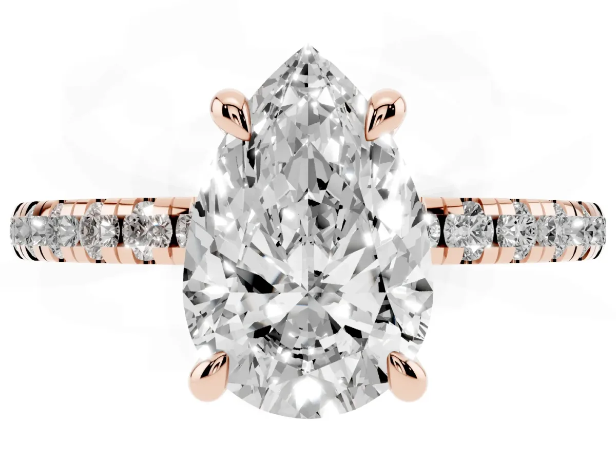 Pear Cut Diamond Brilliant Solitaire Ring with Pavé Band and Four-Prong Setting Rose gold