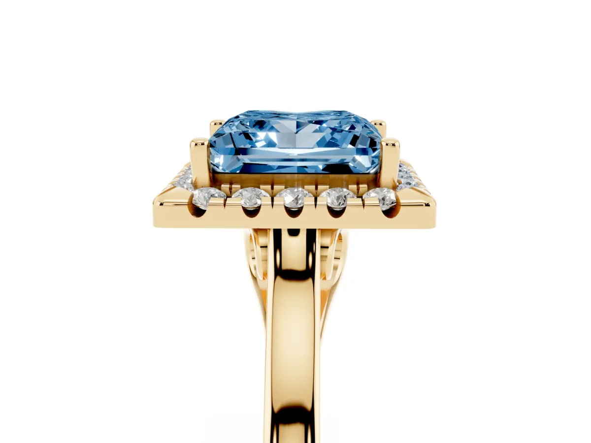 Fancy Blue Princess Cut Halo Round Diamond Solitaire Ring with Pavé Band and Four-Prong Setting Yellow gold