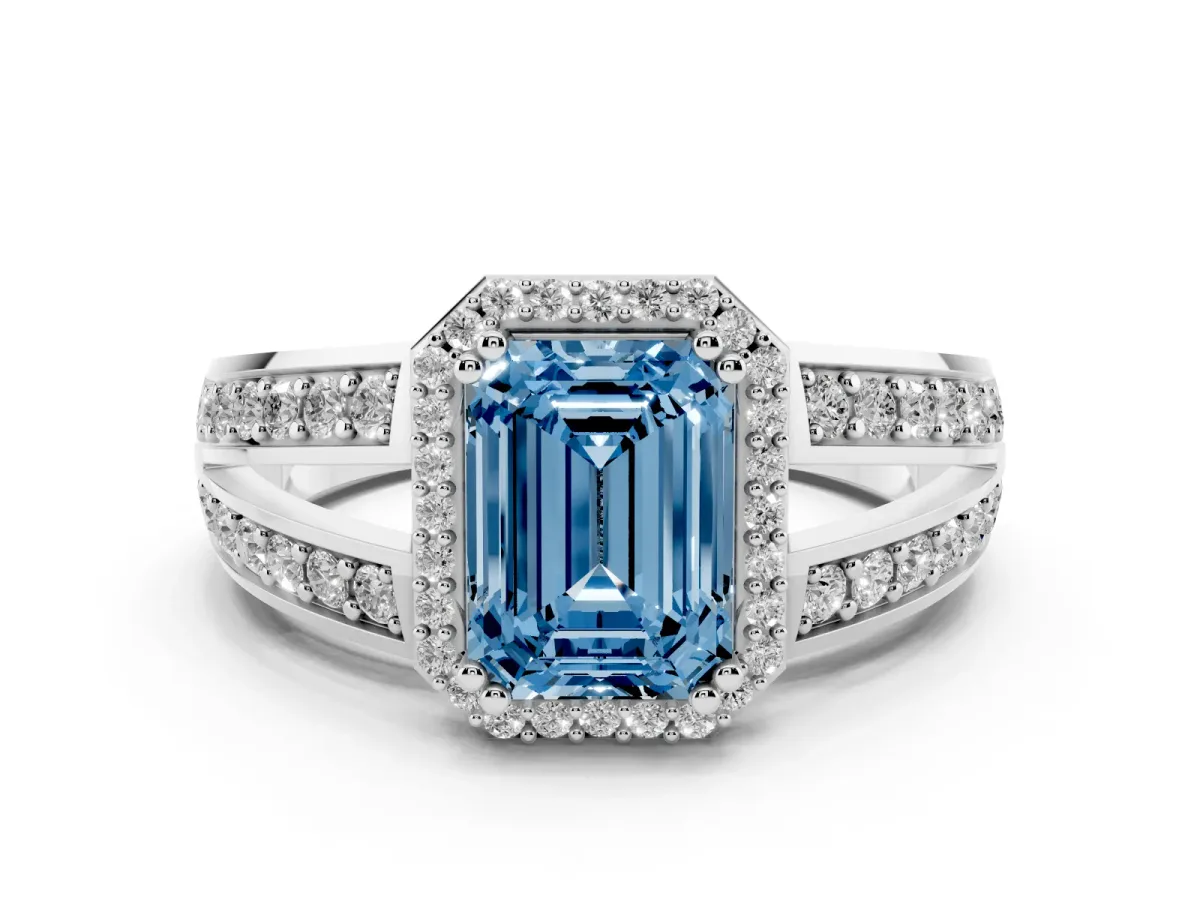 Fancy Blue Emerald Cut Diamond Halo Ring with Split Shank Pavé Band and Four-Prong Setting White gold