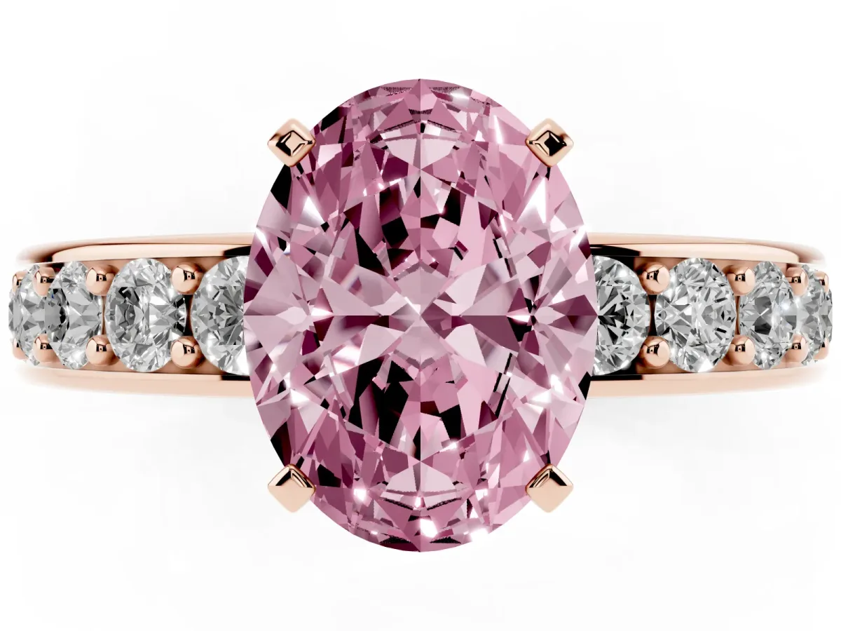 Fancy Pink Oval Cut Diamond Engagement Ring with Channel Set Round Band and Prong Setting Rose gold