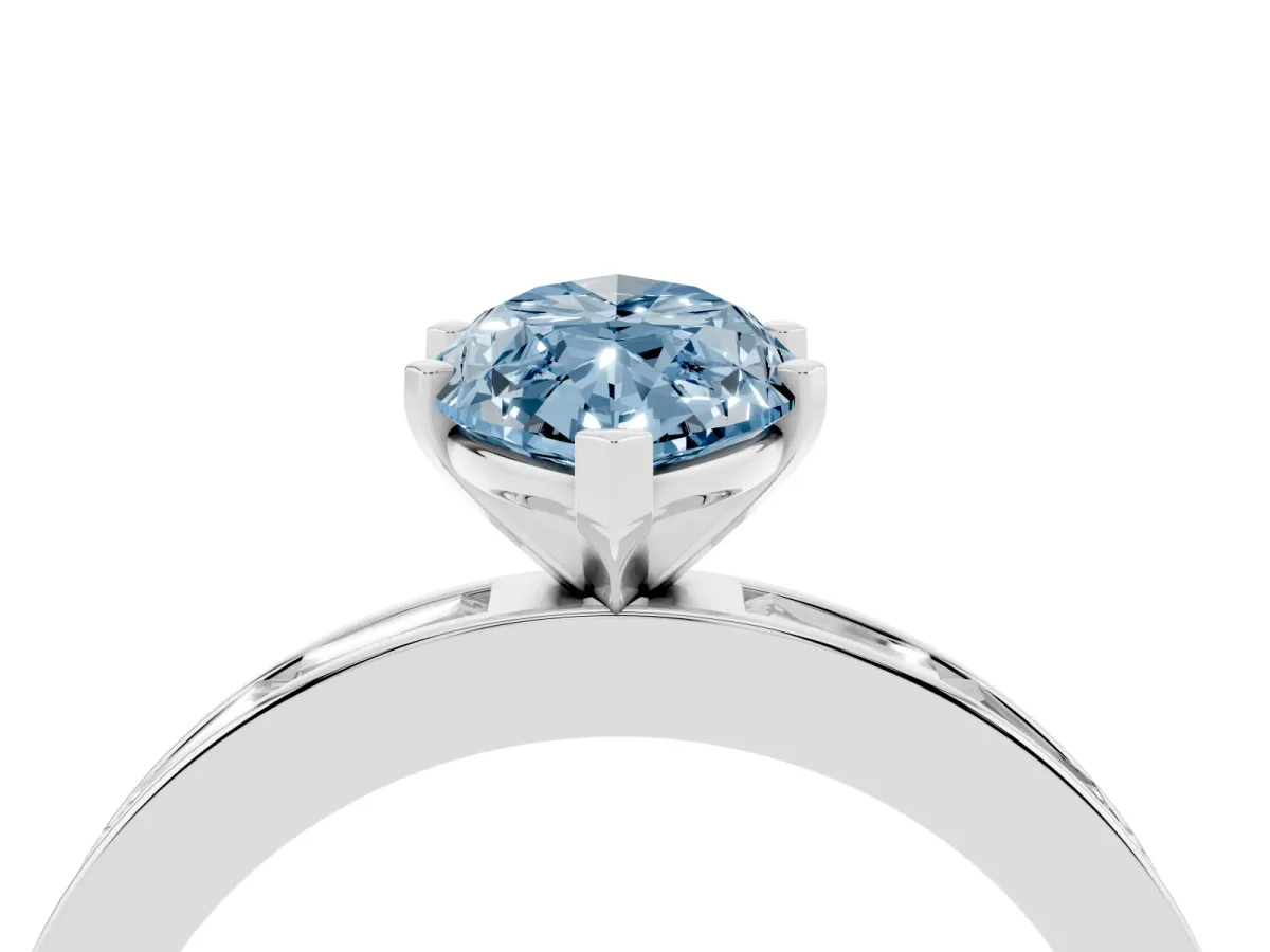 Fancy Blue Marquise Cut Solitaire Diamond Ring with Channel-Set Baguette Band and Four-Prong Setting White gold