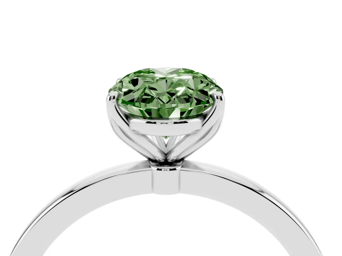 Fancy Green Oval Cut Diamond Solitaire Ring with Thin Band and Prong Setting White gold
