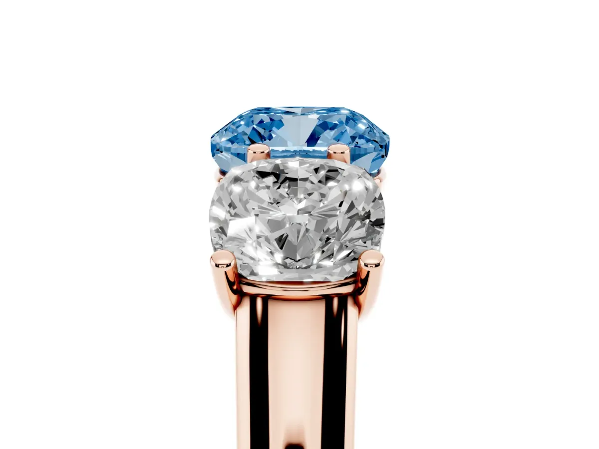 Fancy Blue Cushion Cut Three-Stone Diamond Ring with Prong Setting on a Classic Band Rose gold