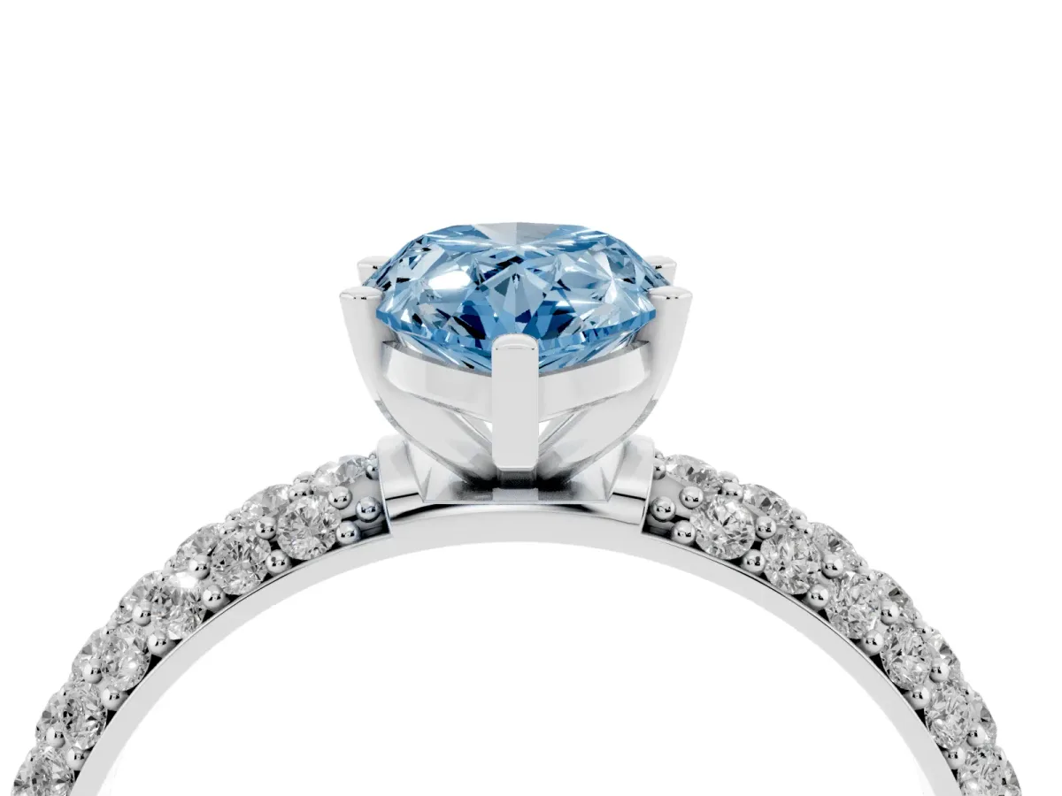 Fancy Blue Pear Cut Diamond Solitaire Ring with Prong Setting and Pavé Band Silver