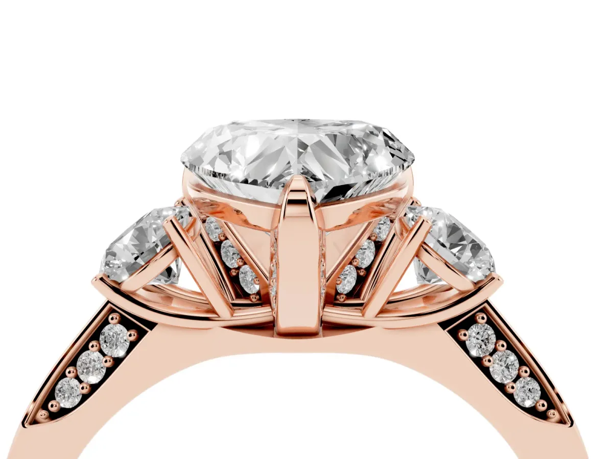 Heart Cut Brilliant Three-Stone Diamond Ring with Pavé Band and Four-Prong Setting Rose gold