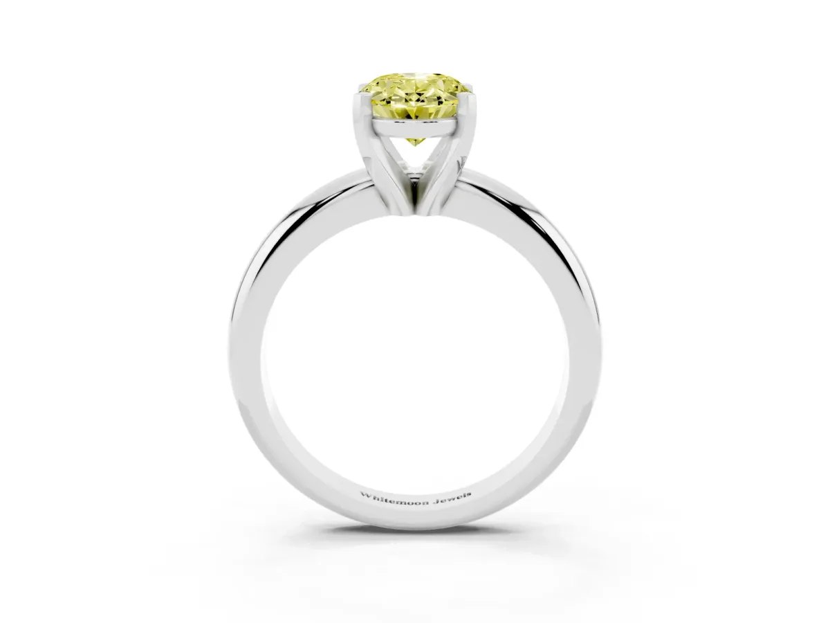 Fancy Yellow Oval Cut Diamond Solitaire Engagement Ring with Round Band and Four-Prong Setting Platinum