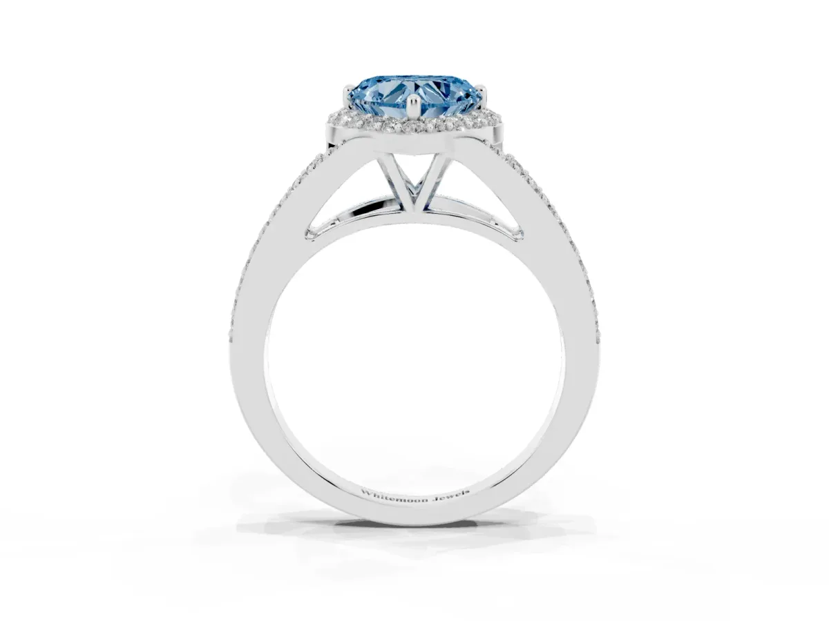Fancy Blue Heart Cut Halo Split Shank Pave Diamond Ring with Four-Prong Setting Silver