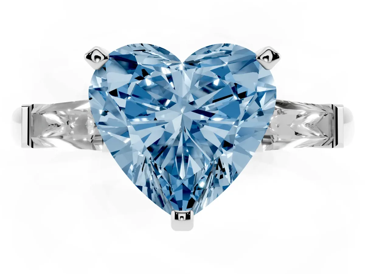 Fancy Blue Heart Cut Solitaire with Tapered Baguette Side Stones on a Classic Band with Four-Prong Setting White gold