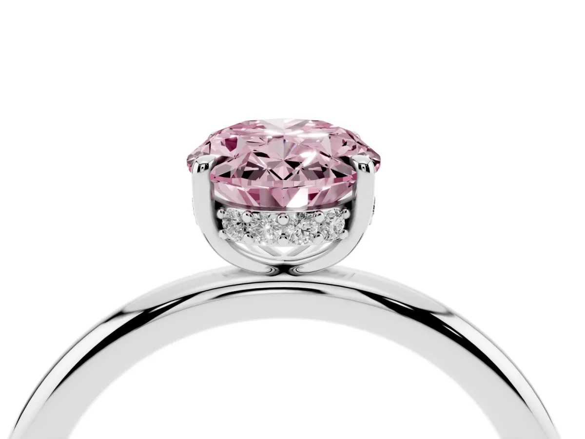 Fancy Pink Oval Cut Diamond Solitaire Ring with Thin Band and Four-Prong Setting Silver