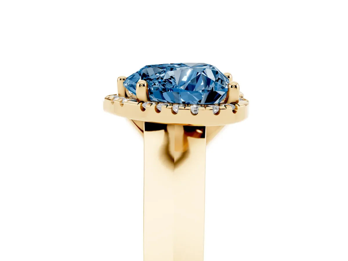 Fancy Blue Heart Cut Halo Diamond Ring with Cathedral Band and Four-Prong Setting Yellow gold