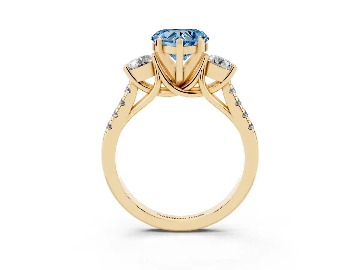 Fancy Blue Three-Stone Heart Cut Diamond Pavé Band with Four-Prong Setting Yellow gold