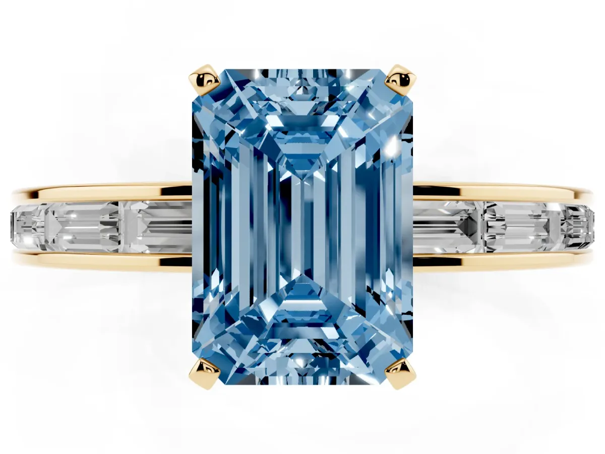 Fancy Blue Emerald Cut Solitaire Diamond Ring with Channel-Set Baguette Band and Four-Prong Setting Yellow gold