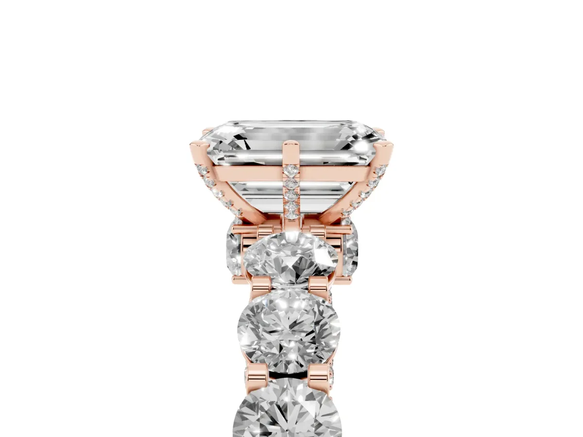Emerald Cut Diamond Side Stone Engagement Ring with Four-Prong Setting Rose gold
