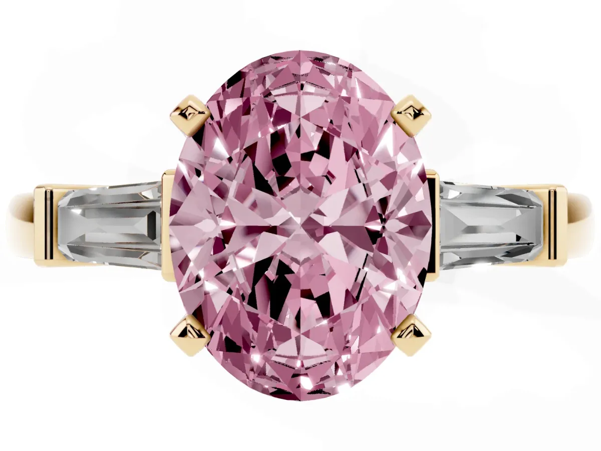 Fancy Pink Oval Cut Cut Diamond Solitaire Ring with Tapered Baguette Accents and Four-Prong Setting Yellow gold