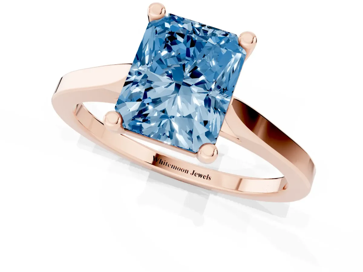 Fancy Blue Radiant Cut Solitaire Diamond Ring with Four-Prong Setting and Tapered Band Rose gold