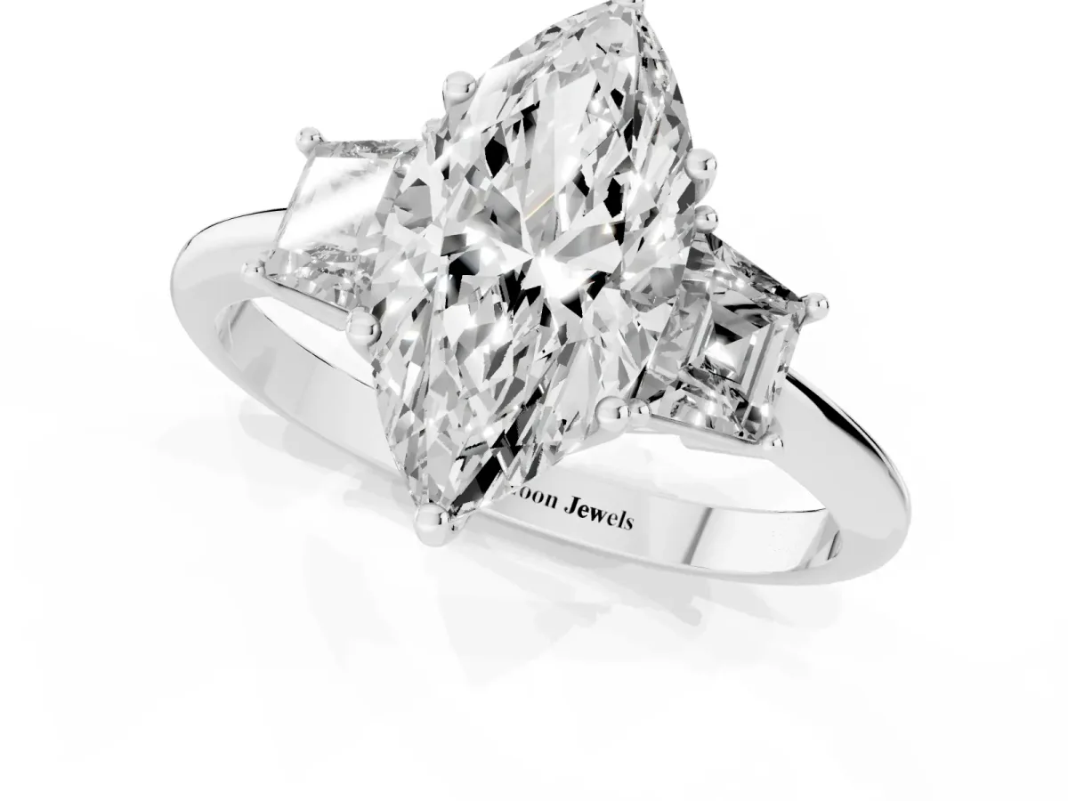 Marquise Cut Diamond Three-Stone Ring with Trapezoid Side Stones and Prong Setting White gold