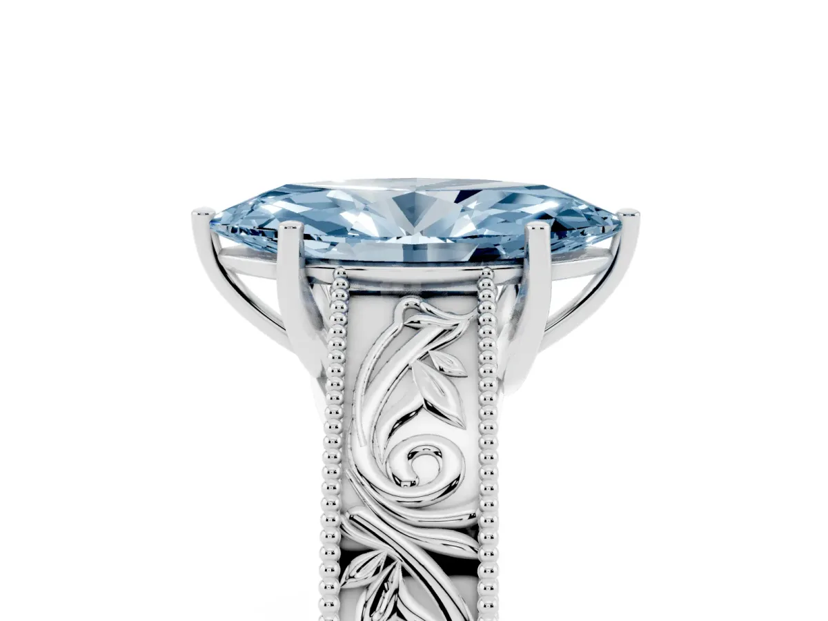 Fancy Blue Marquise Cut Diamond Solitaire Ring with Engraved Band and Four-Prong Setting White gold