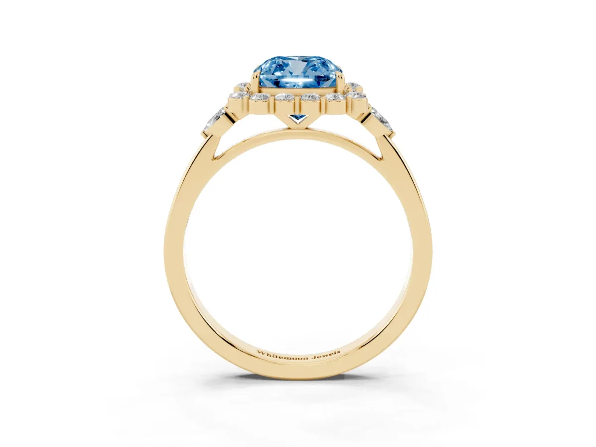 Fancy Blue Cushion Cut Diamond Halo Ring with Pear Side Stones and Prong Setting Yellow gold