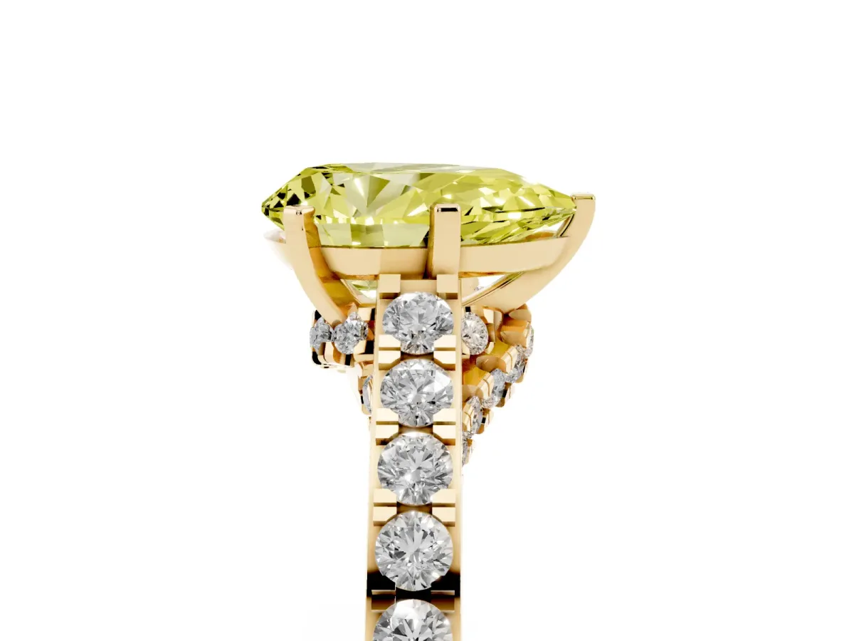 Fancy Yellow Pear Cut Diamond Solitaire Ring with Crossover Gallery and Round Pavé Band Yellow gold