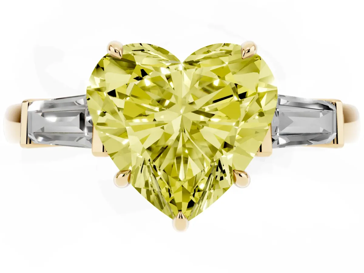 Fancy Yellow Heart Cut Diamond Three-Stone Ring with Tapered Baguette Side Stones and Prong Setting Yellow gold