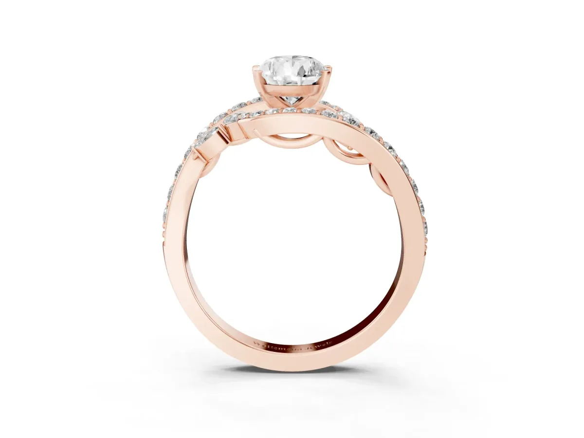 Pear Cut Solitaire with Pavé Twist Band and Four-Prong Setting Rose gold
