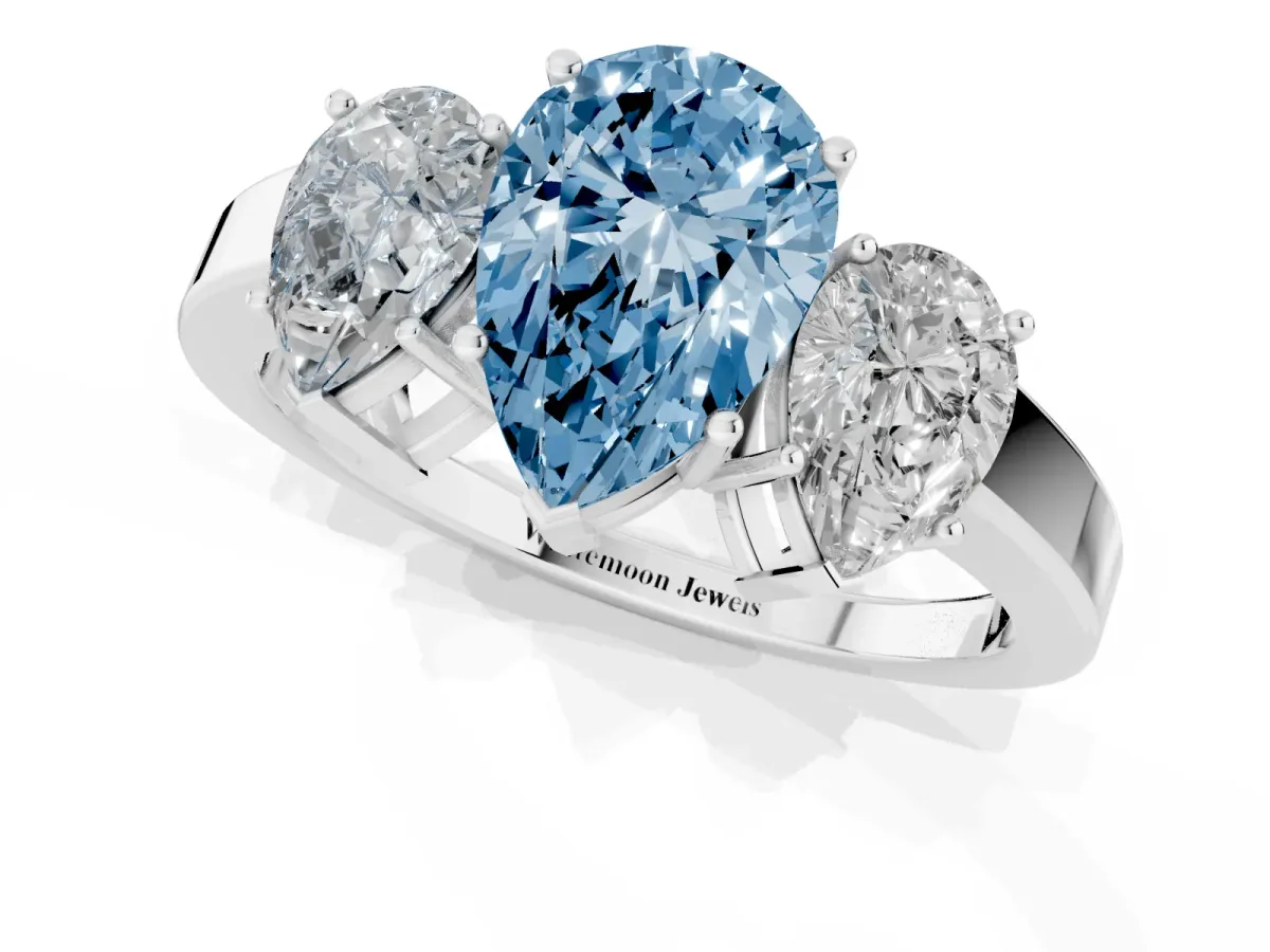 Fancy Blue Three-Stone Pear Cut Cut Diamond Engagement Ring with Flat Band and Four-Prong Setting Platinum