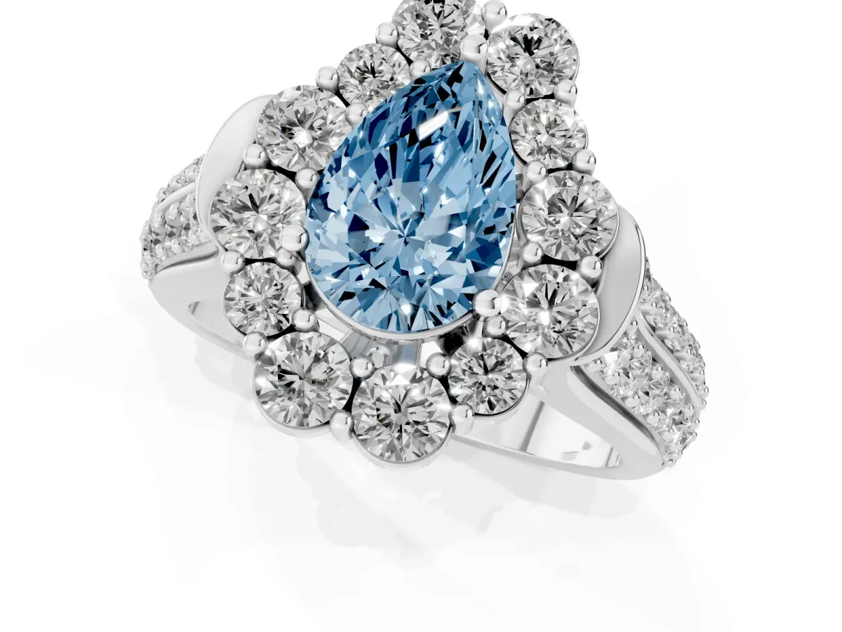 Fancy Blue Pear Cut Halo Diamond Engagement Ring with Split Shank and Prong Setting Silver