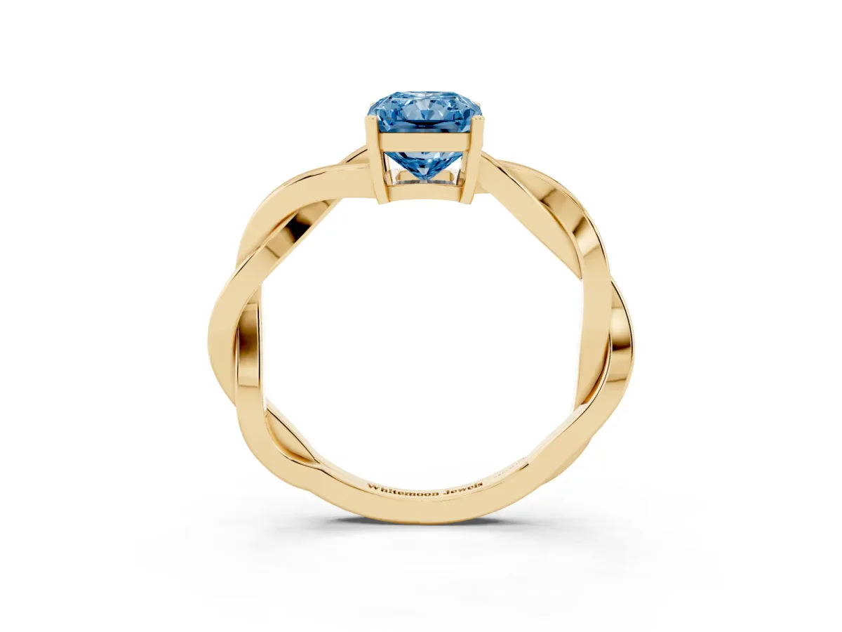 Fancy Blue Radiant Cut Solitaire Twisted Pave Diamond Ring with Four-Prong Setting Yellow gold