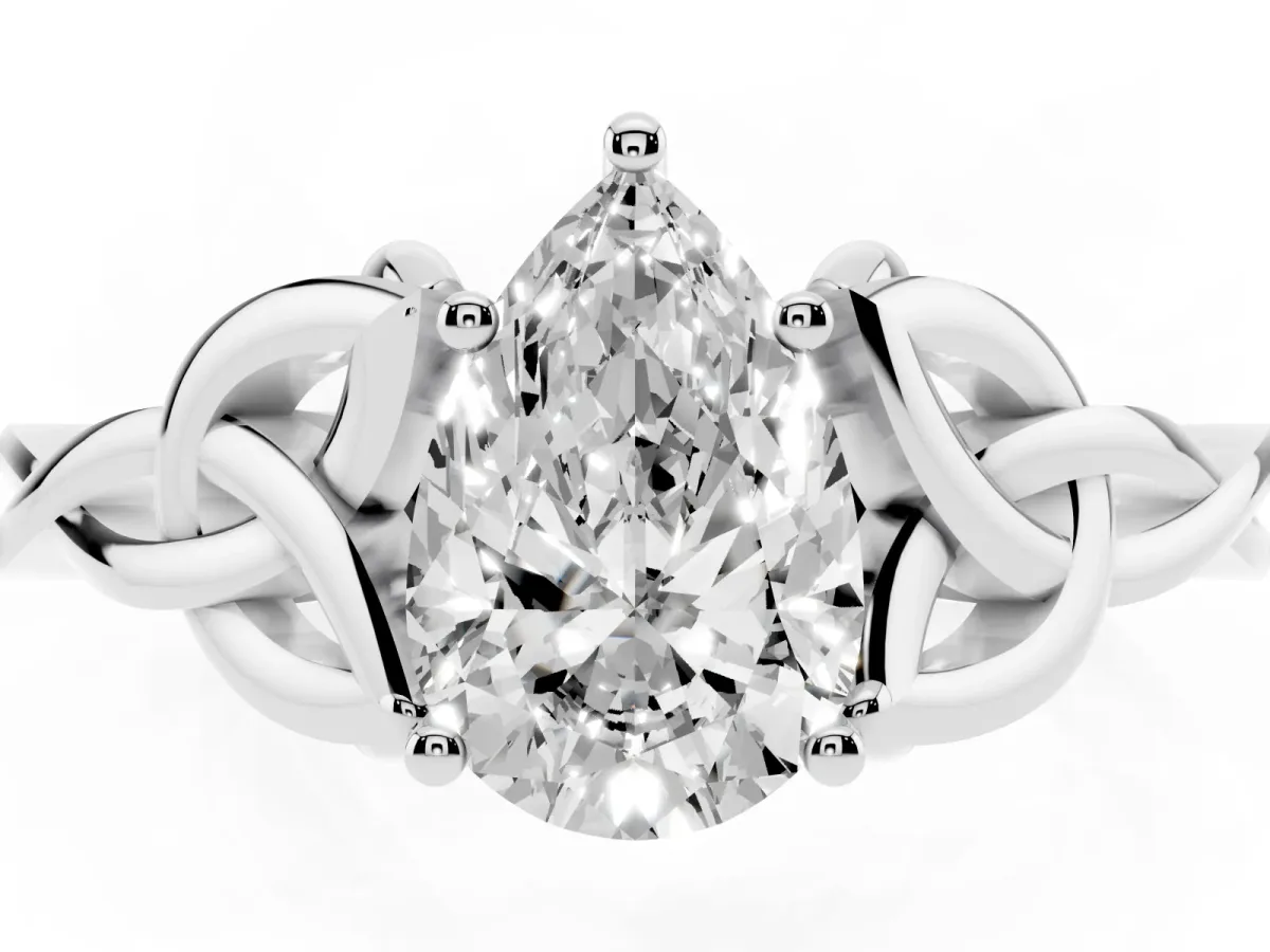 Pear Cut Diamond Solitaire Engagement Ring with Celtic Knot Band and Four-Prong Setting White gold