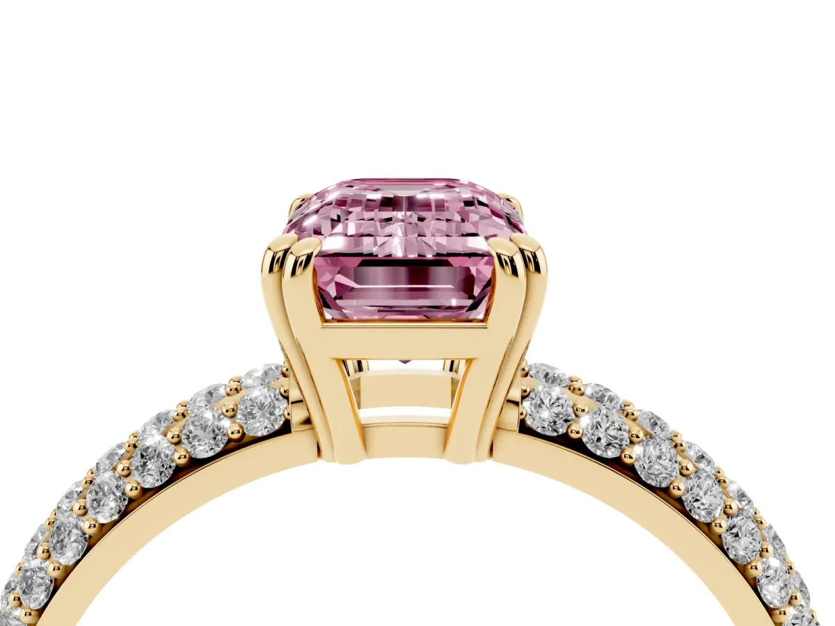 Fancy Pink Emerald Cut Diamond Solitaire Ring with Multi-Row Round Pavé Band and Prong Setting Yellow gold