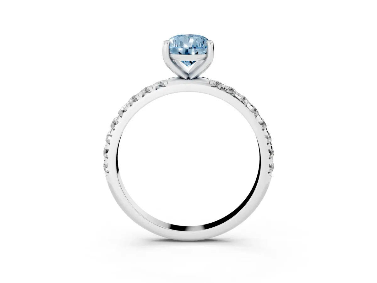 Fancy Blue Pear Cut Cut Diamond Solitaire Ring with Micro Pave Band and Four Prong Setting Silver