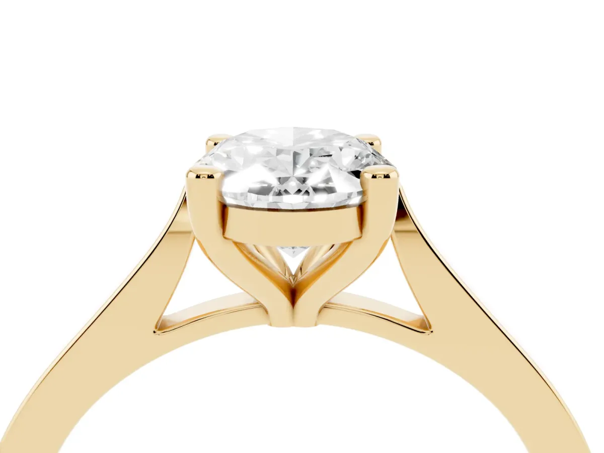Oval Cut Solitaire Diamond Ring with Four-Prong Setting and Tapered Band Yellow gold