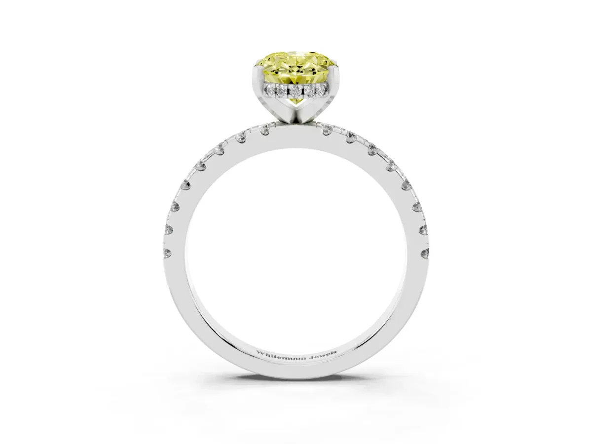 Fancy Yellow Oval Cut Diamond Solitaire Ring with Round Pavé Band and Four-Prong Setting Silver