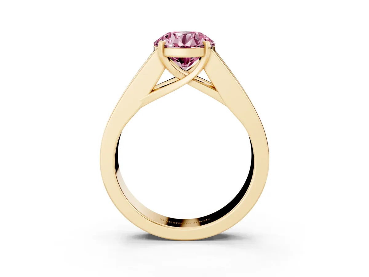 Fancy Pink Round Cut Cut Channel Set Solitaire Ring with Four-Prong Setting Yellow gold