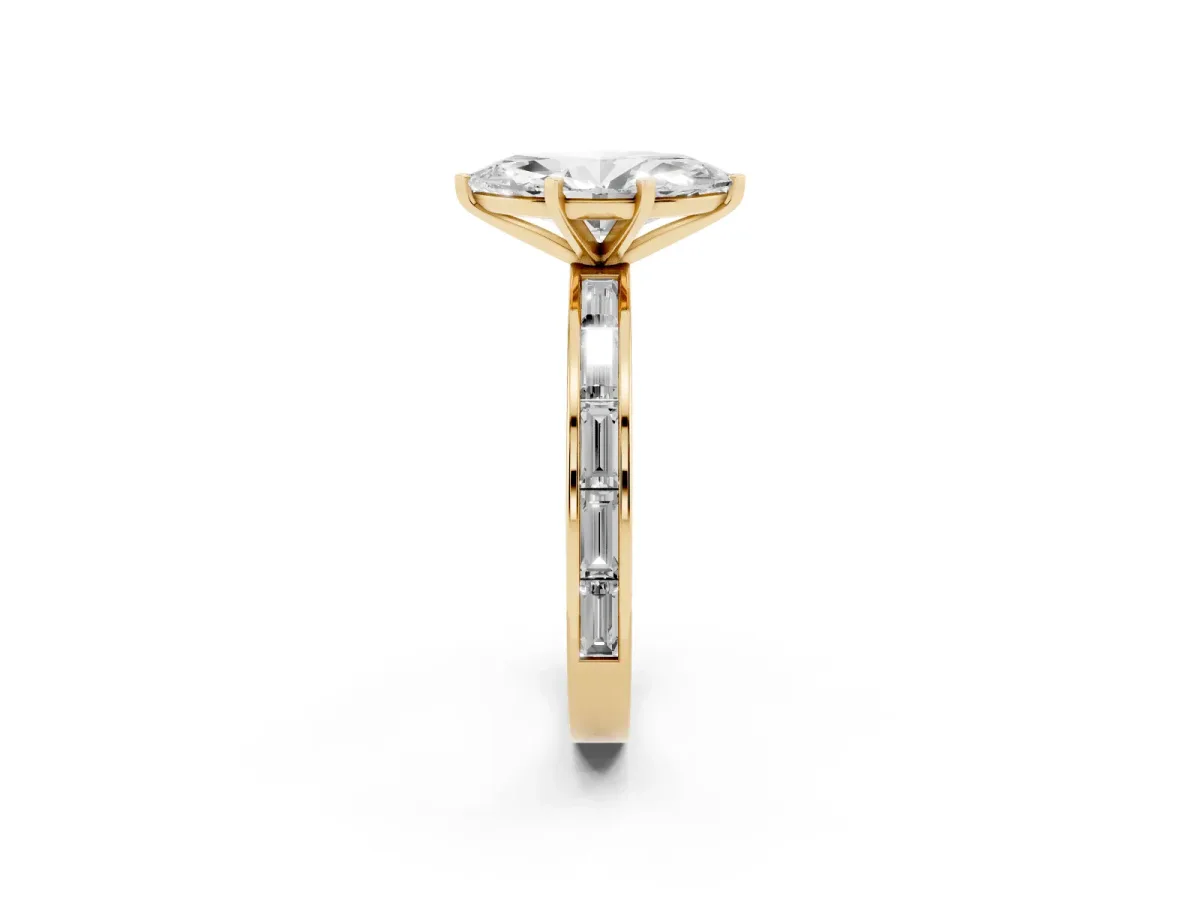 Marquise Cut Solitaire Diamond Ring with Channel-Set Baguette Band and Four-Prong Setting Yellow gold