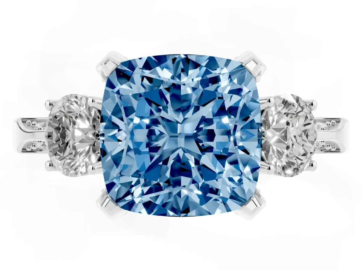 Fancy Blue Cushion Cut Brilliant Three-Stone Diamond Ring with Pavé Band and Four-Prong Setting White gold