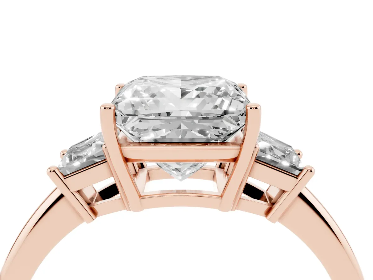 Princess Cut Diamond Three-Stone Ring with Trapezoid Side Stones and Prong Setting Rose gold