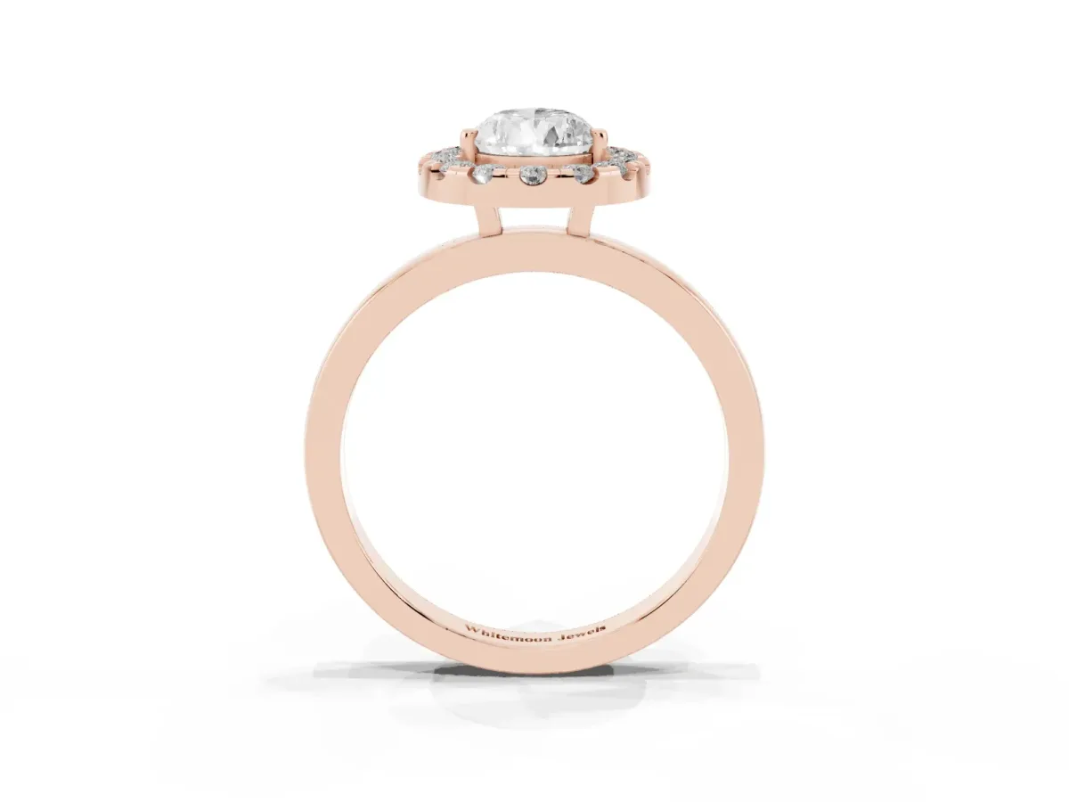 Pear Cut Halo Diamond Solitaire with Pavé Band and Four-Prong Setting Rose gold