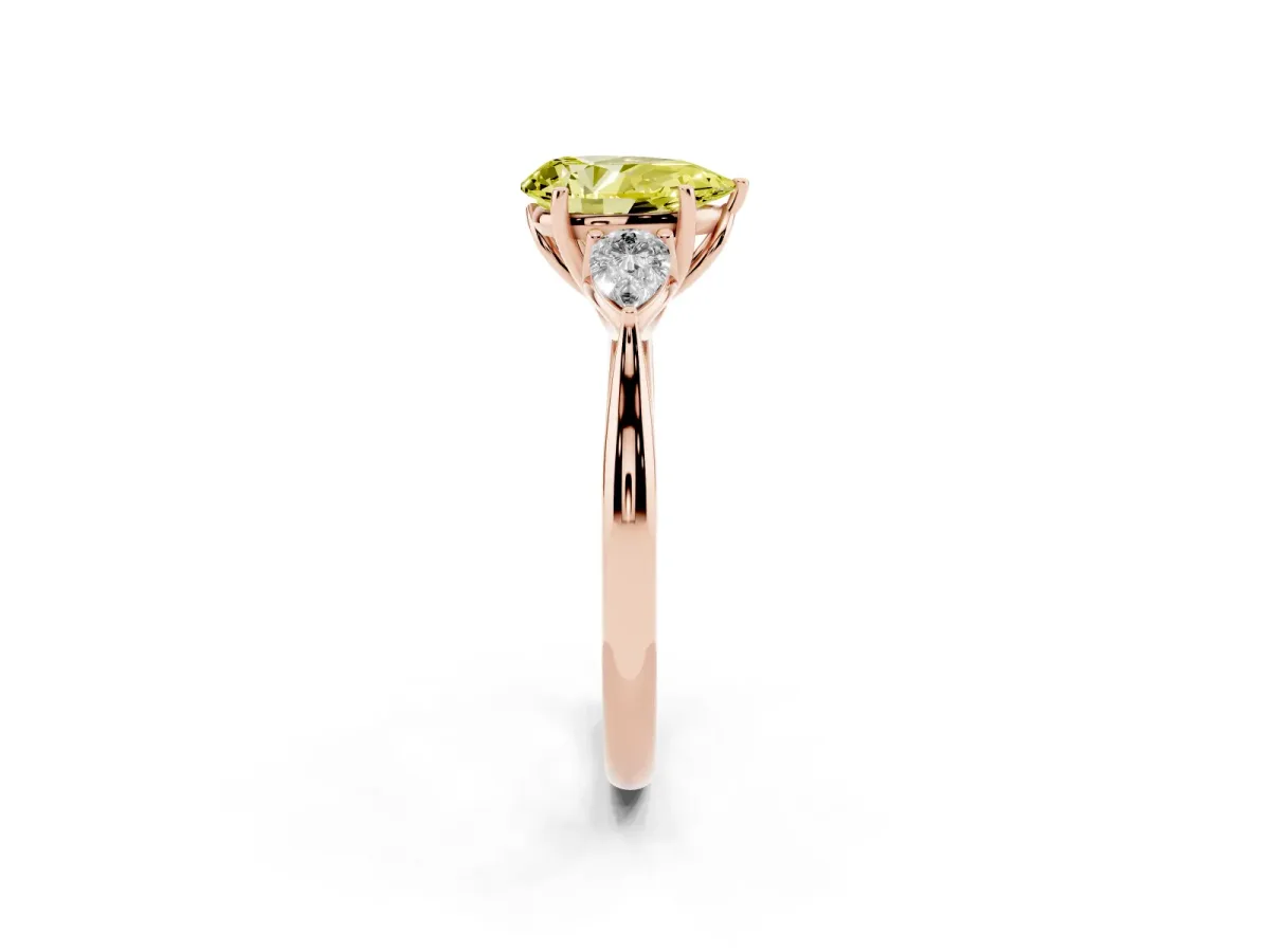 Fancy Yellow Three-Stone Pear Cut Diamond Ring with Pear Side Stones in Four-Prong Setting Rose gold