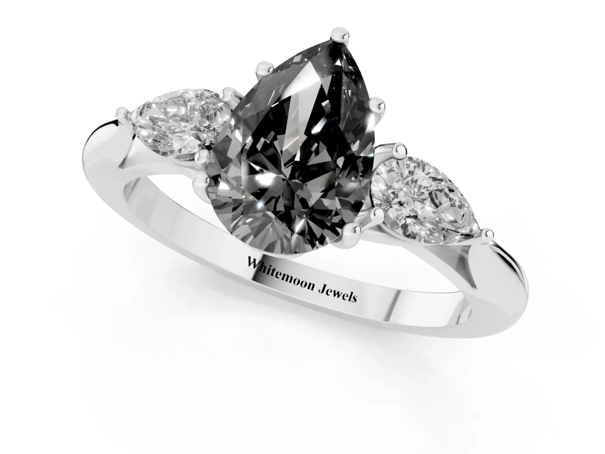 Fancy Black Three-Stone Pear Cut Brilliant Diamond Solitaire Ring with Tapered Band and Four-Prong Setting Platinum