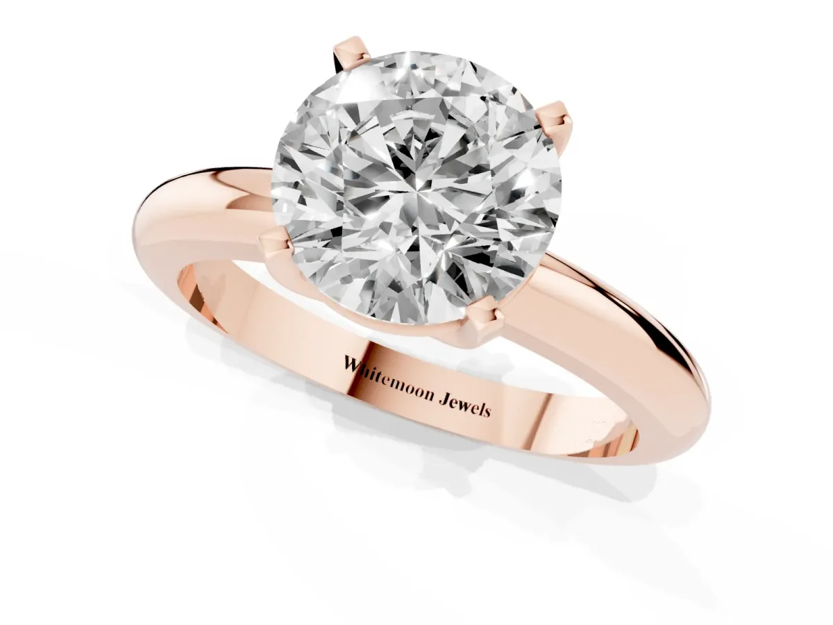 Round Cut Diamond Solitaire Engagement Ring with Round Band and Four-Prong Setting Rose gold